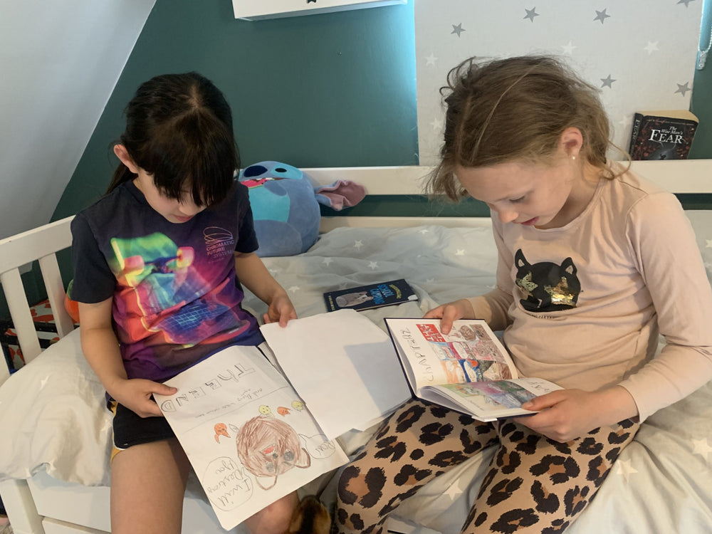 Children taking part in Little Book Factory creative writing sessions